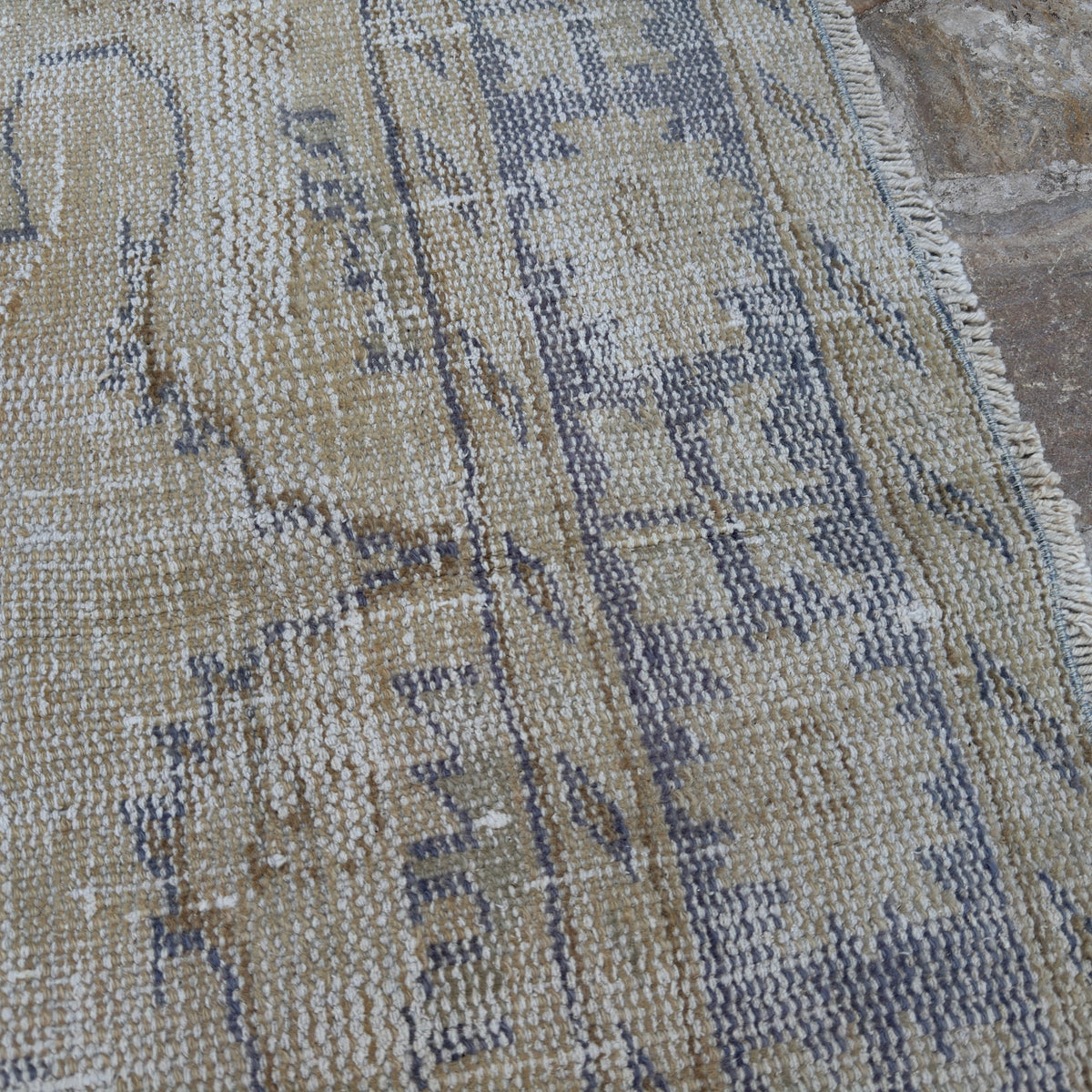 1970s blue vintage Turkish wool distressed rug with medallion design, hand-knotted weave and low pile.