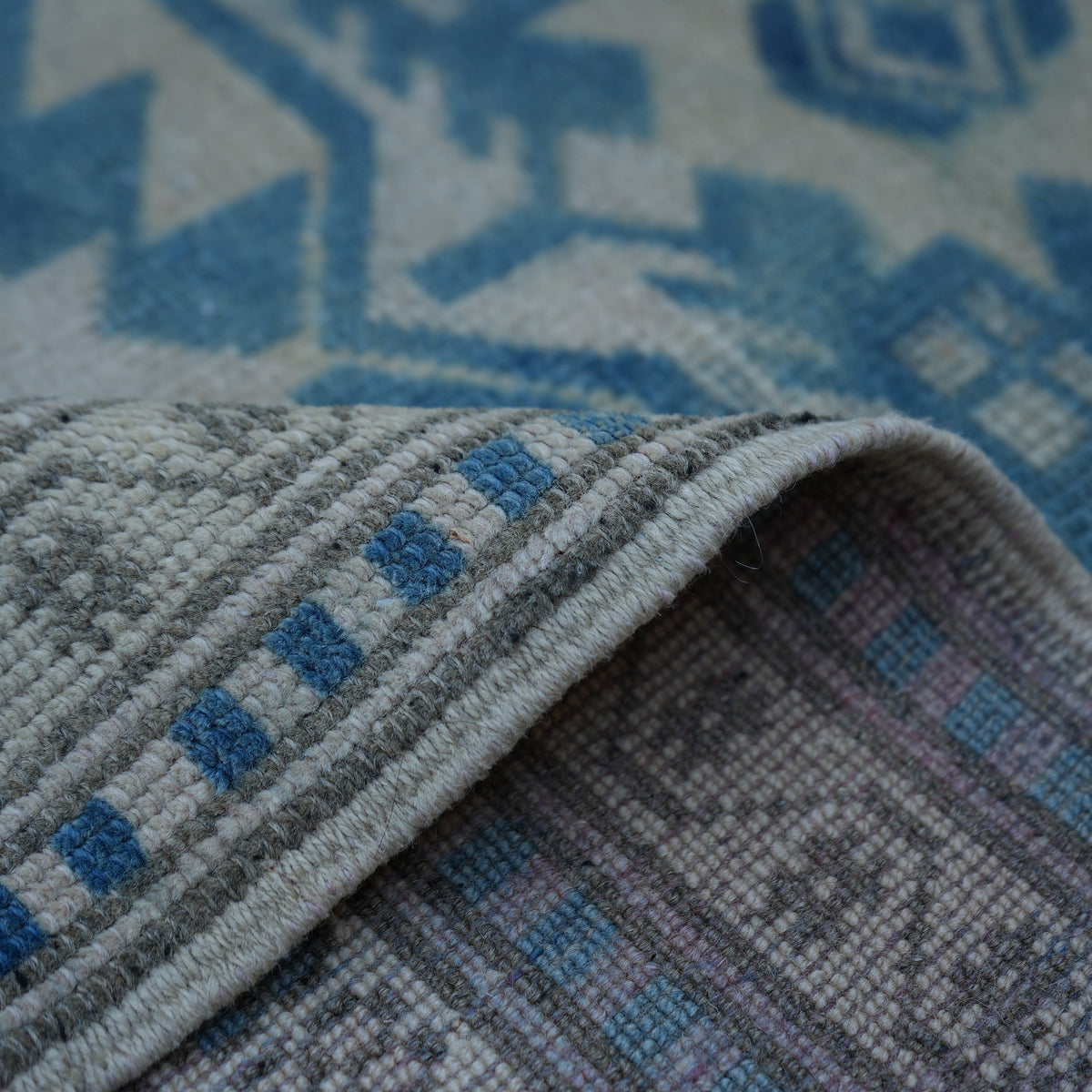 Additional view of the blue vintage Turkish wool rug, hand-knotted in wool.