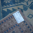 Blue 3' x 4' vintage Turkish wool rug from the 1970s with neutral design.