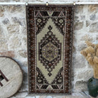 Brown 3' x 7' vintage wool rug with traditional design, handmade in Turkey – Hoyt.
