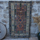 Blue 4' x 6' vintage wool rug with traditional design, handmade in Turkey – Tasia.