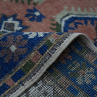 Additional view of the blue vintage Turkish wool rug, hand-knotted in wool.