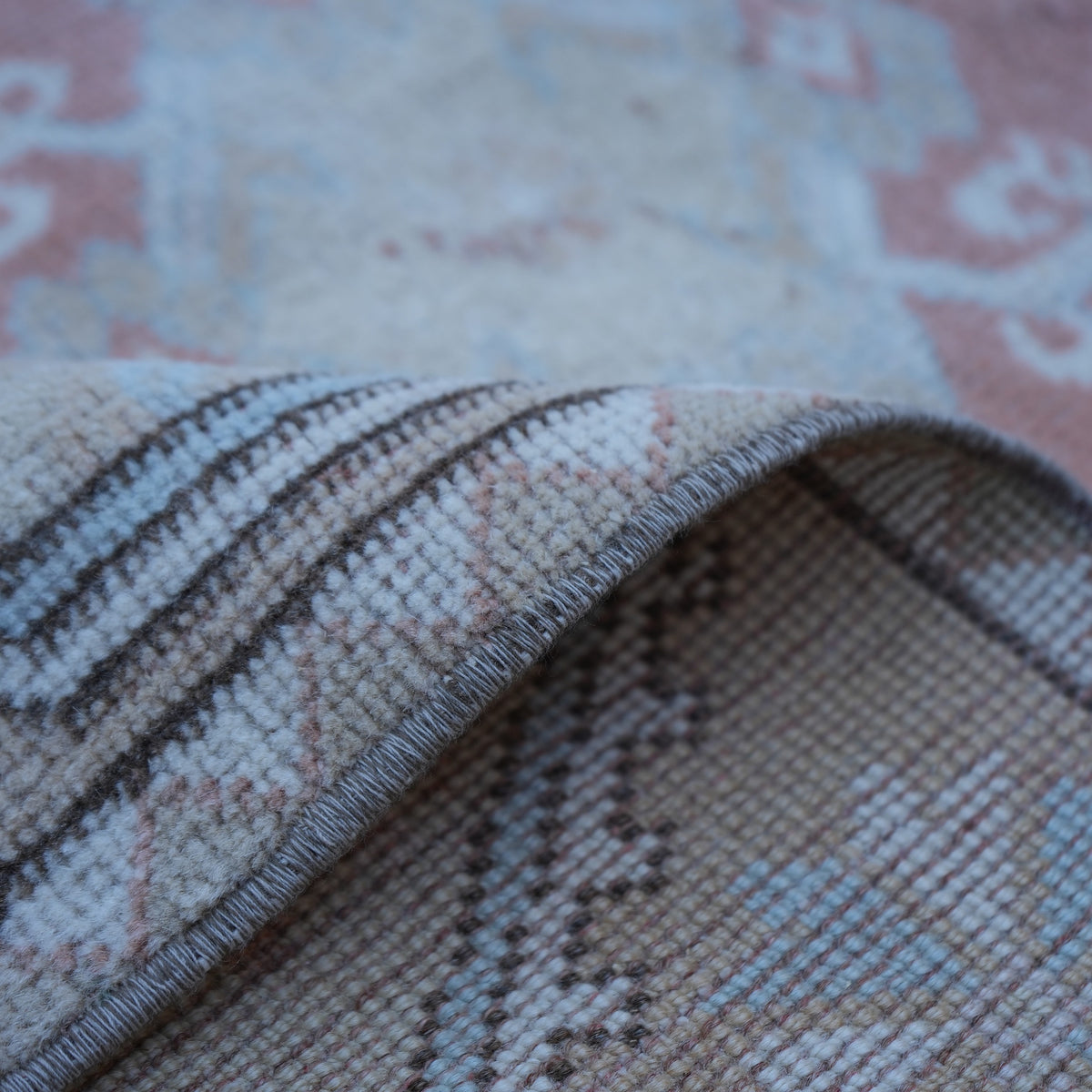 Additional view of the beige vintage Turkish wool rug, hand-knotted in wool.
