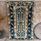 Blue 4' x 7' vintage wool rug with neutral design, handmade in Turkey – Jenny.