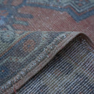 Additional view of the orange vintage Turkish wool rug, hand-knotted in wool.