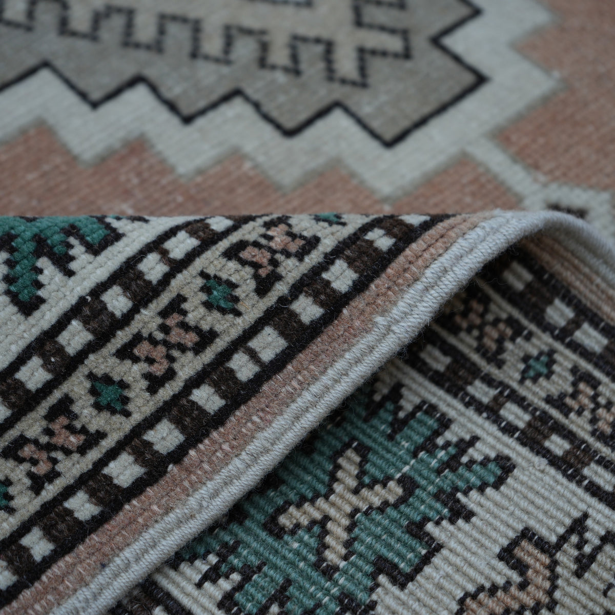 Additional view of the beige vintage Turkish wool rug, hand-knotted in wool.