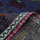 Additional view of the purple vintage Turkish wool rug, hand-knotted in wool.