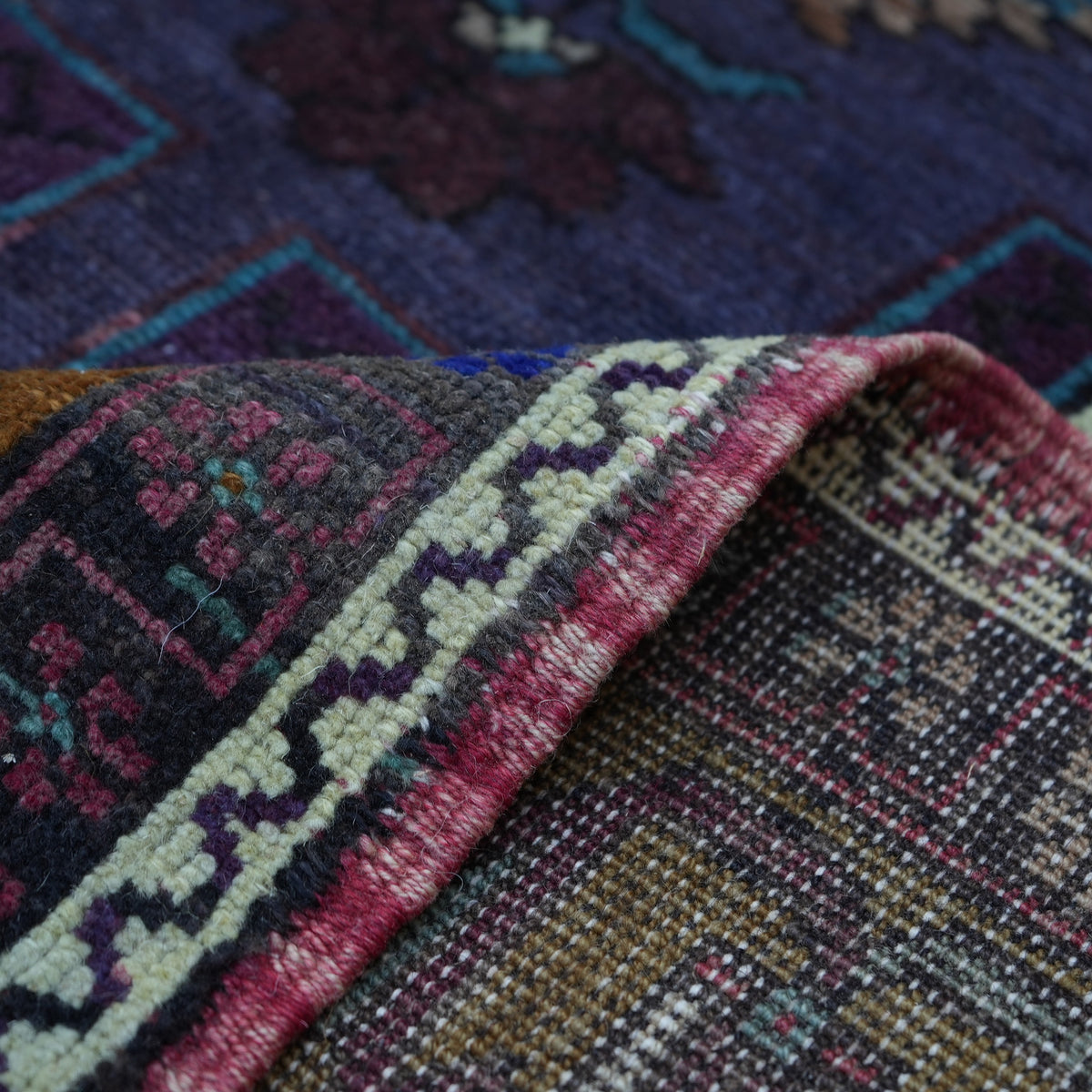 Additional view of the purple vintage Turkish wool rug, hand-knotted in wool.
