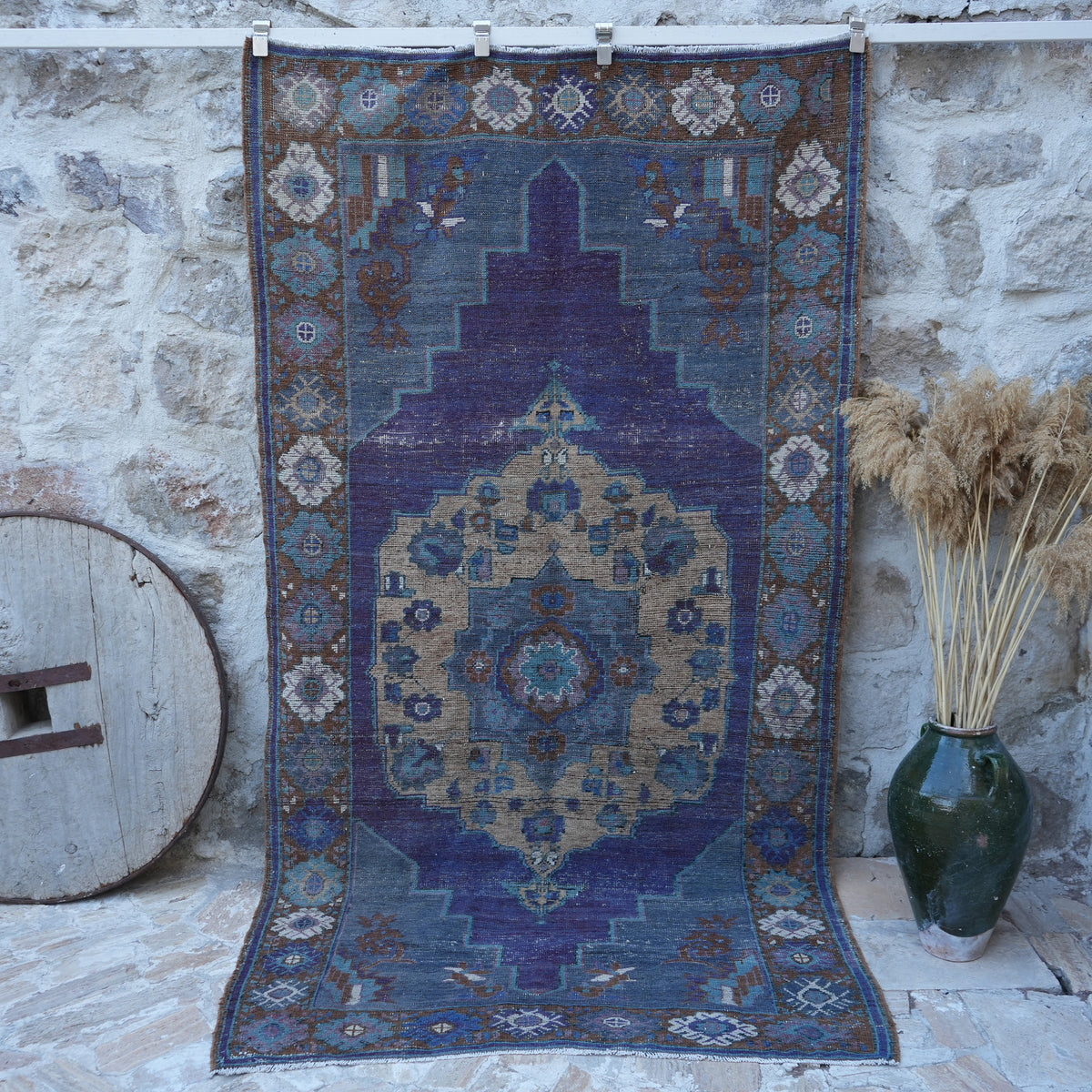 Purple 5' x 9' vintage wool rug with traditional design, handmade in Turkey – Odelle.