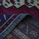 Additional view of the red vintage Turkish wool rug, hand-knotted in wool.