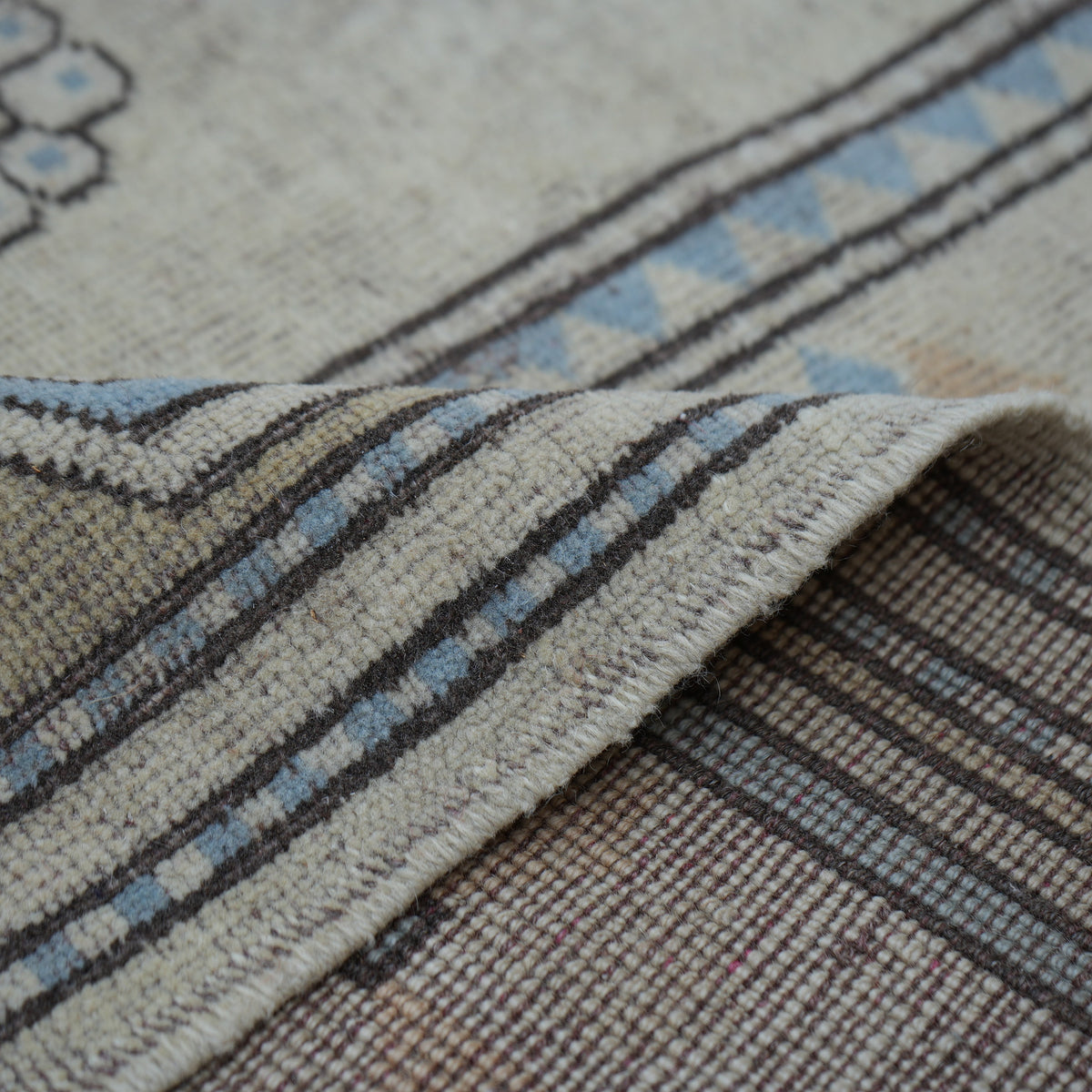 Additional view of the pale blue vintage Turkish wool rug, hand-knotted in wool.
