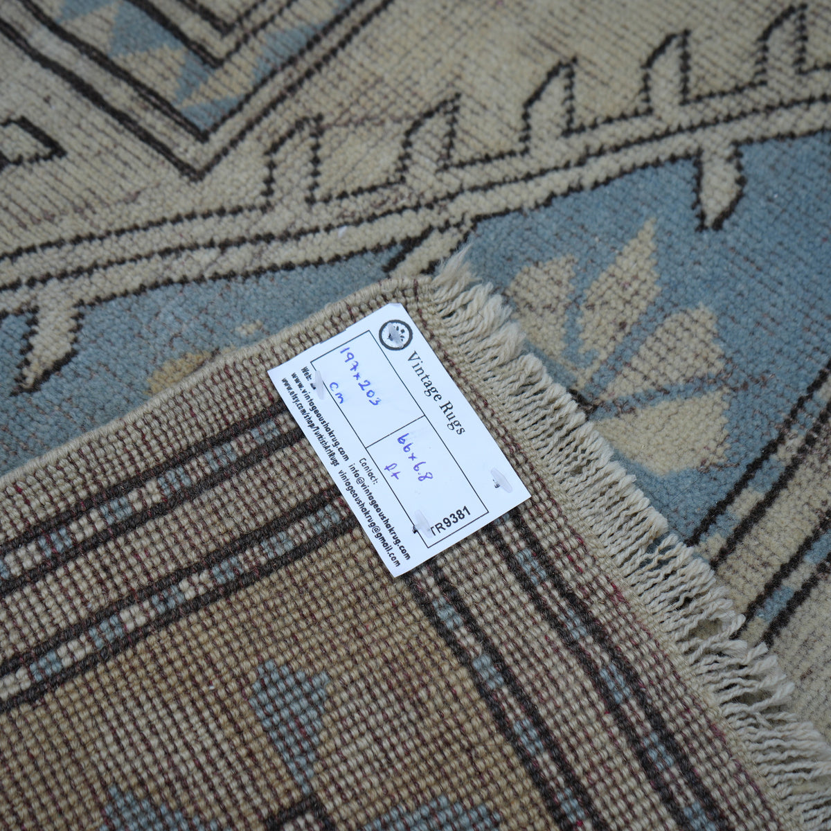 Pale Blue 6' x 7' vintage Turkish wool rug from the 1970s with geometric design.