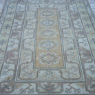 Close-up of the beige vintage Turkish wool rug showing neutral details, hand-knotted weave, wool and low pile.