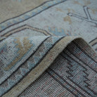Additional view of the beige vintage Turkish wool rug, hand-knotted in wool.