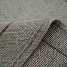 Additional view of the beige vintage Turkish wool rug, hand-knotted in wool.