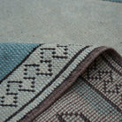 Additional view of the pale blue vintage Turkish wool rug, hand-knotted in wool.