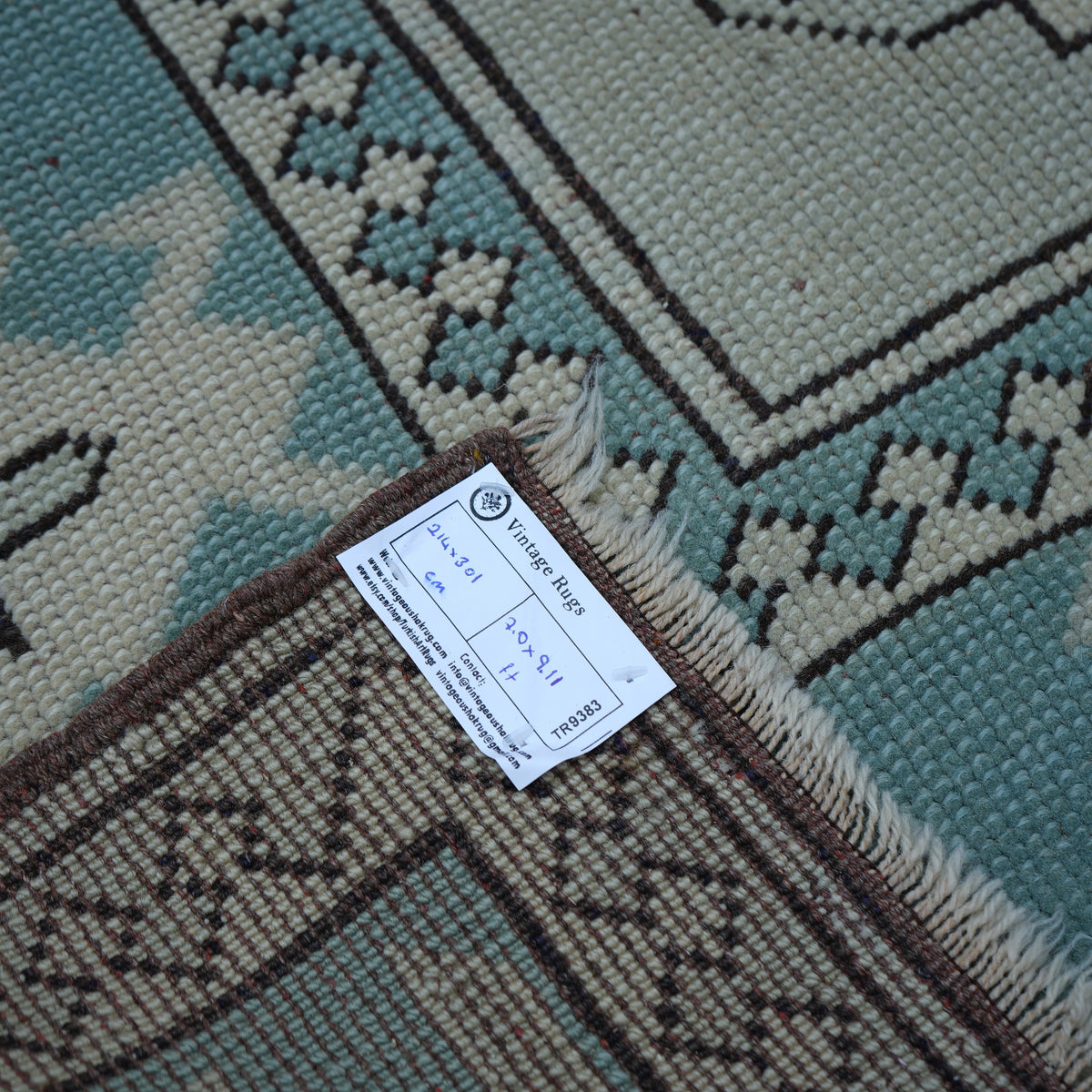 Pale Blue 7' x 10' vintage Turkish wool rug from the 1970s with geometric design.