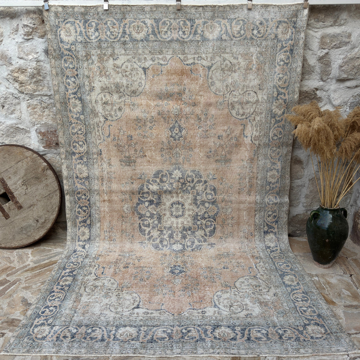 Orange 7' x 11' vintage wool rug with medallion design, handmade in Turkey – Tabby.