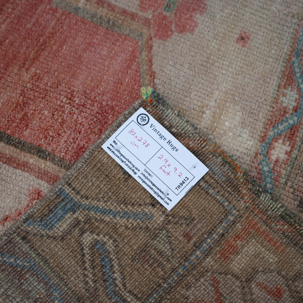 Red 3' x 9' Turkish wool runner rug from the 1970s with traditional design.
