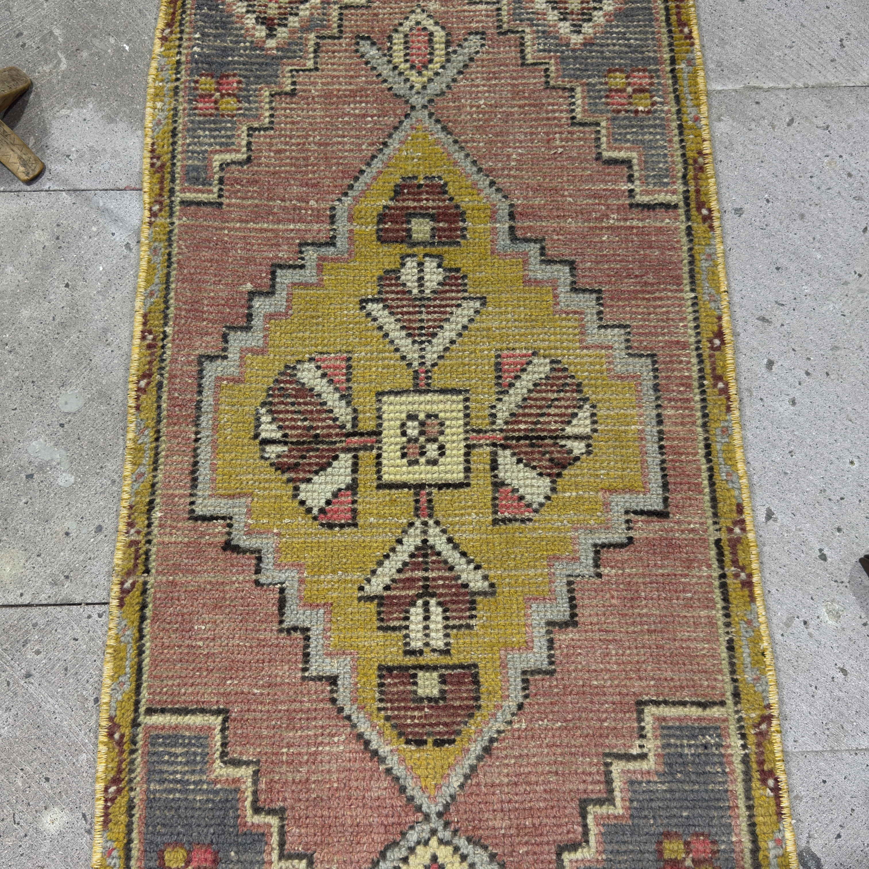 1970s yellow Turkish wool traditonal rug with traditional design, hand-knotted weave and low pile.