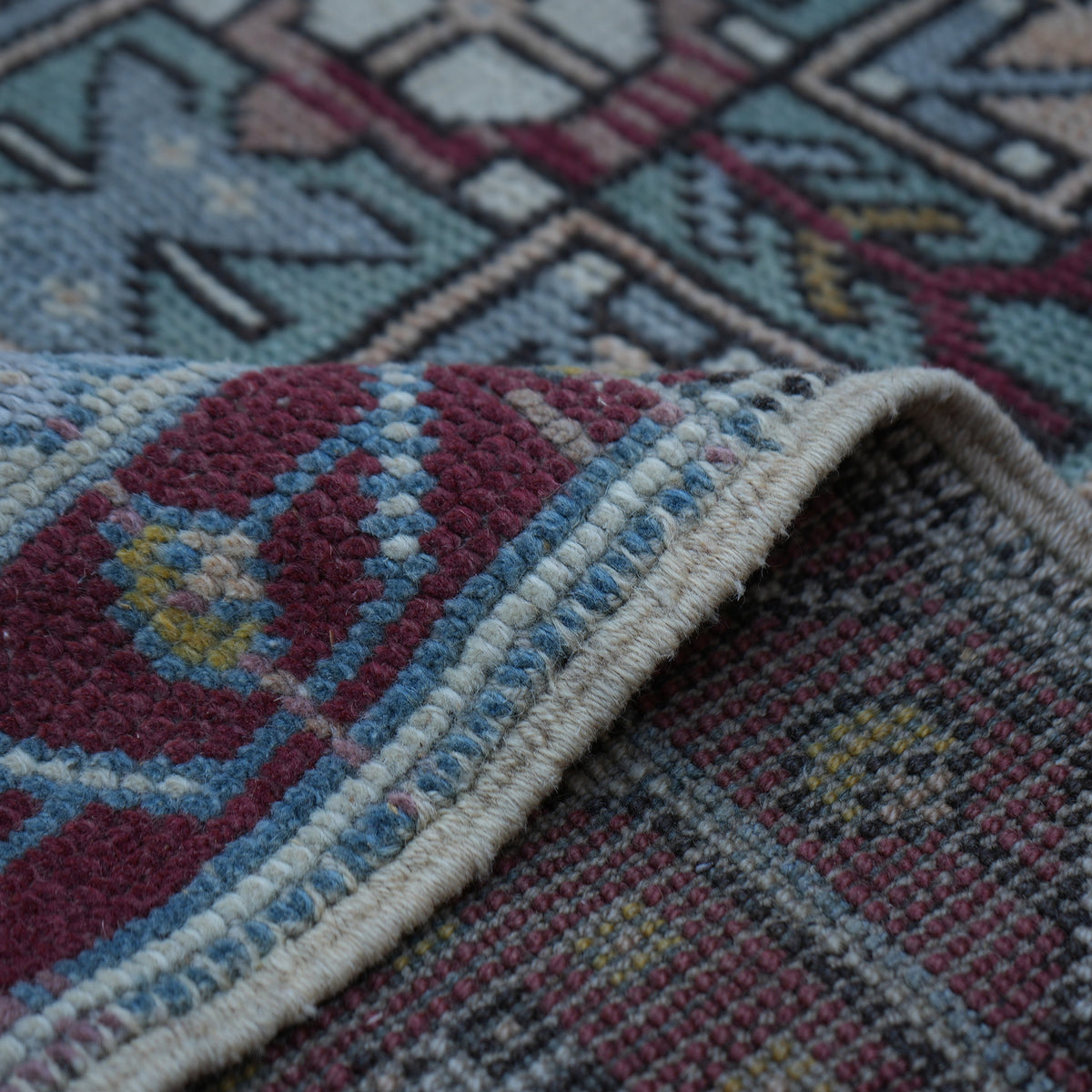 Additional view of the blue Turkish wool vintage rug, hand-knotted in wool.
