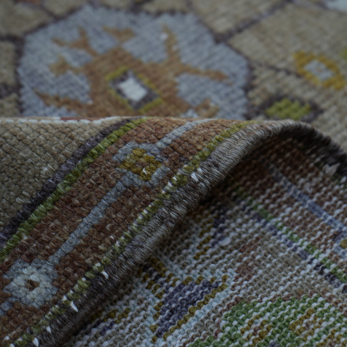 Additional view of the brown Turkish wool vintage rug, hand-knotted in wool.